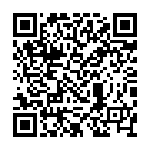 刚才从何珊珊的电话里传出来了歌声……很显然二维码生成