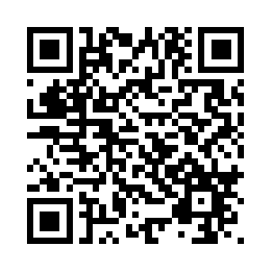 在会议厅看这场实况会议的记者们二维码生成