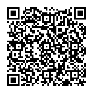 城堡的外墙是随意的从四周的山地捡来的大大小小的碎石块堆垒成一个宽约三十米二维码生成