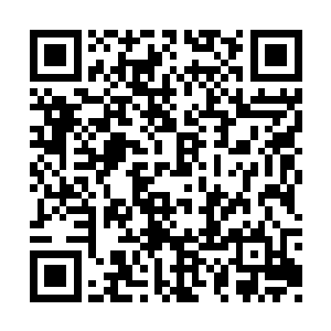 新上任的教导主任悄悄地走到校长钟景华的身边二维码生成