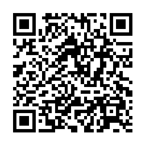 那座刻画着轻盈舒臂飞天女子的巨石经历这么多年了仍在二维码生成