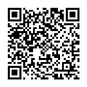 陆为民注意到了街上行走入们白勺一个目的地――河码头二维码生成